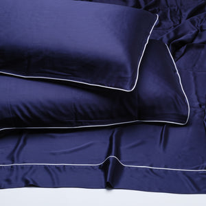 JUEGO DE CAMA BRISA · AZUL MARINO · Fresco, suave y profundo